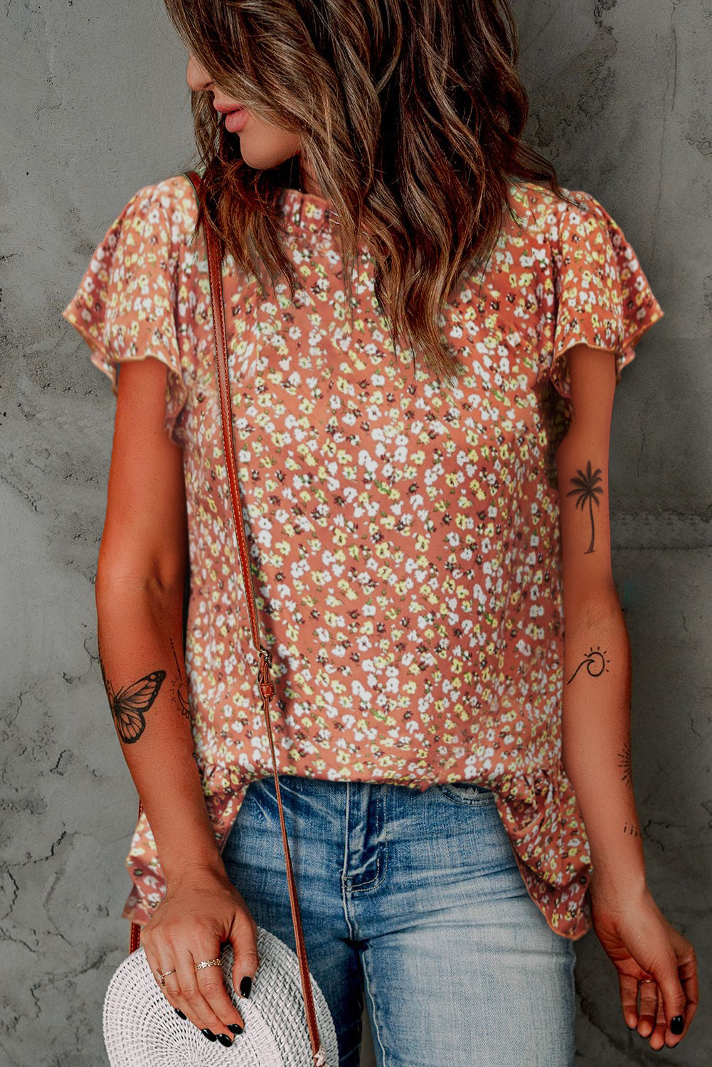 Blusa floral con ribete de volantes y mangas con volantes